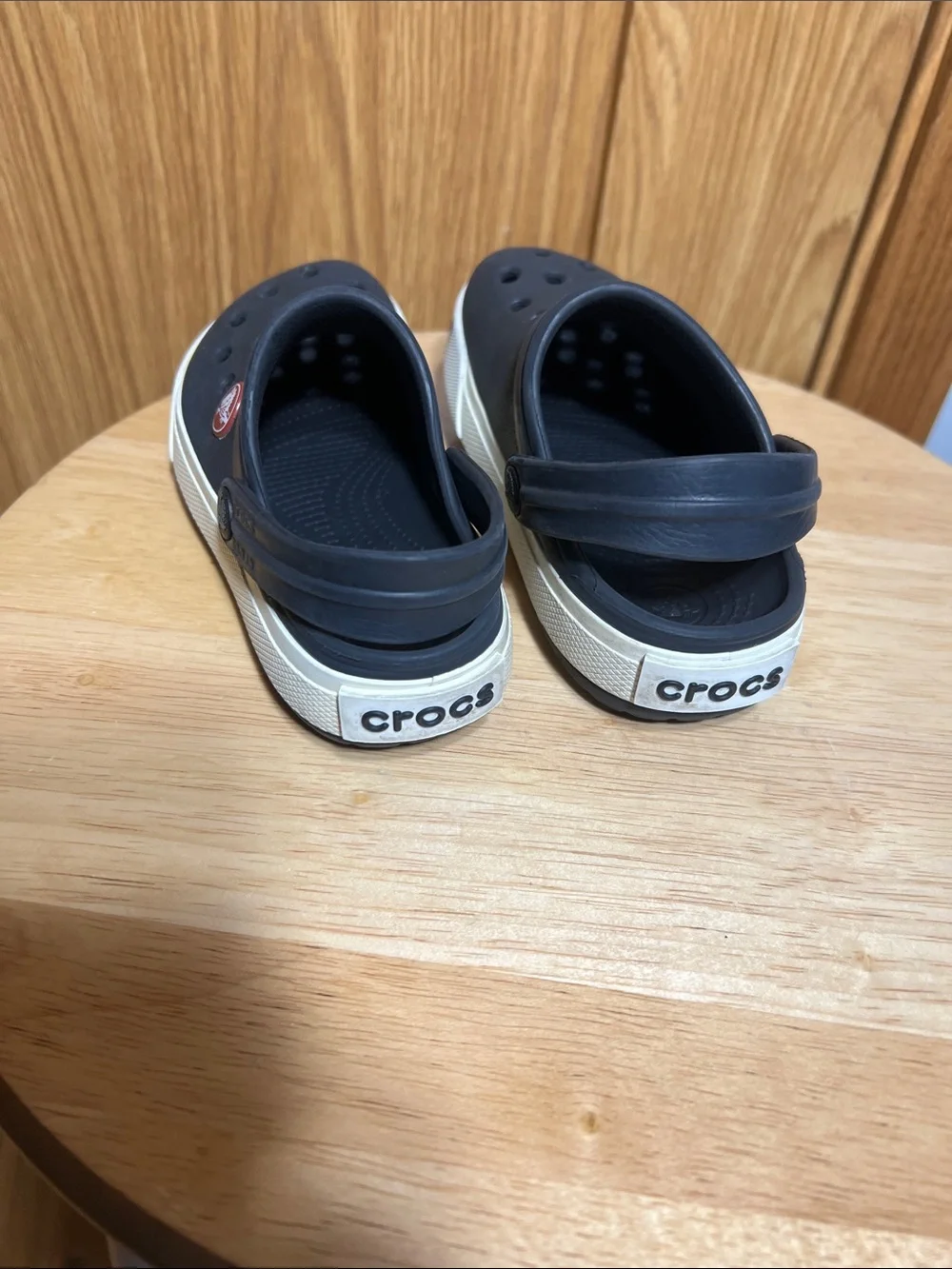 CROCS Kids Black Clogs with White Trim and Red Logo